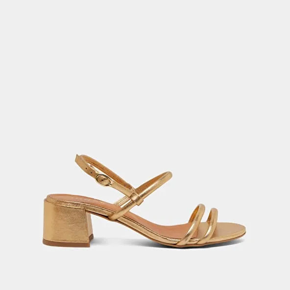 Heeled sandals in gold metallic leather