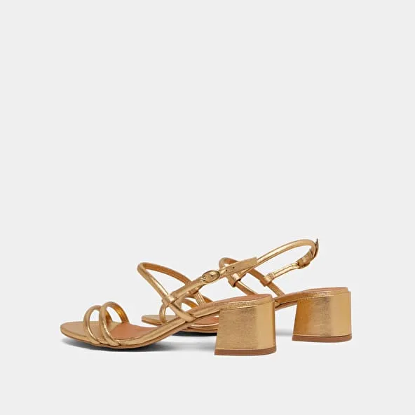 Heeled sandals in gold metallic leather