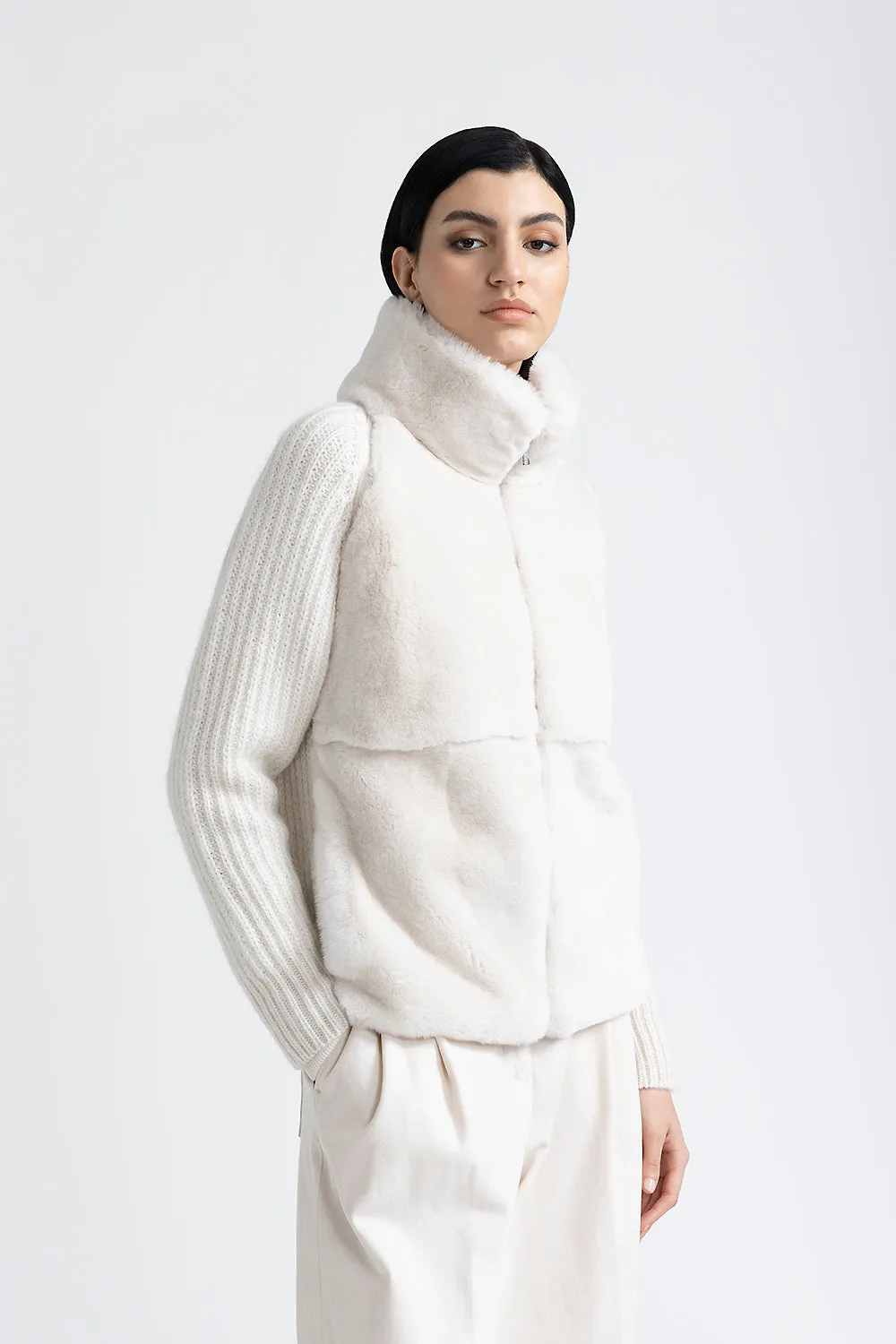 Knitted high neck jacket with fur trim