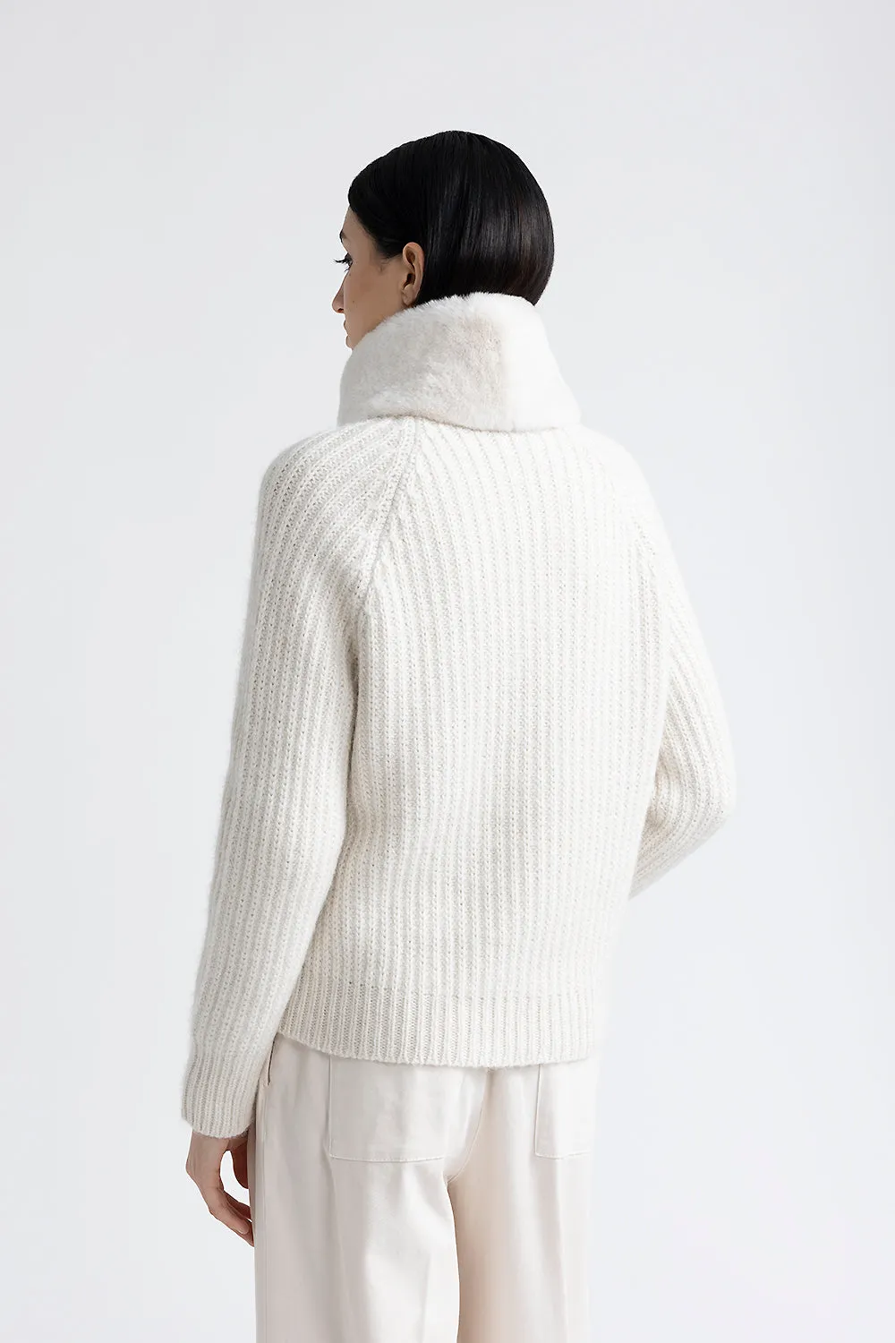 Knitted high neck jacket with fur trim