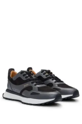 Leather trainers with layered uppers and padded collar